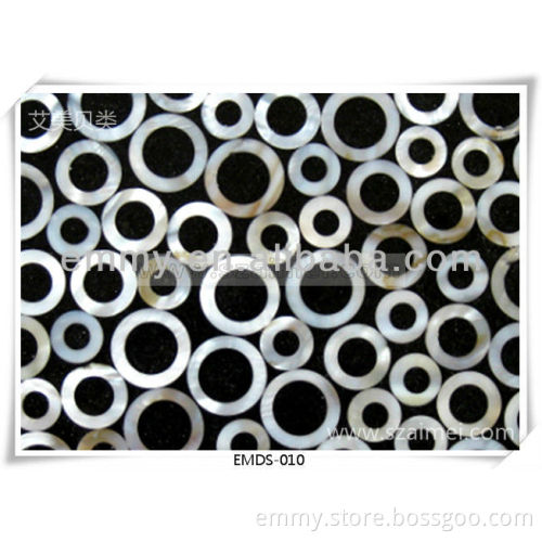 Annular shell mosaic wall tiles with black glue